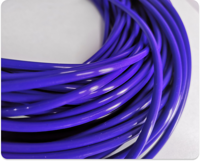 Large purple O-rings stacked on each other
